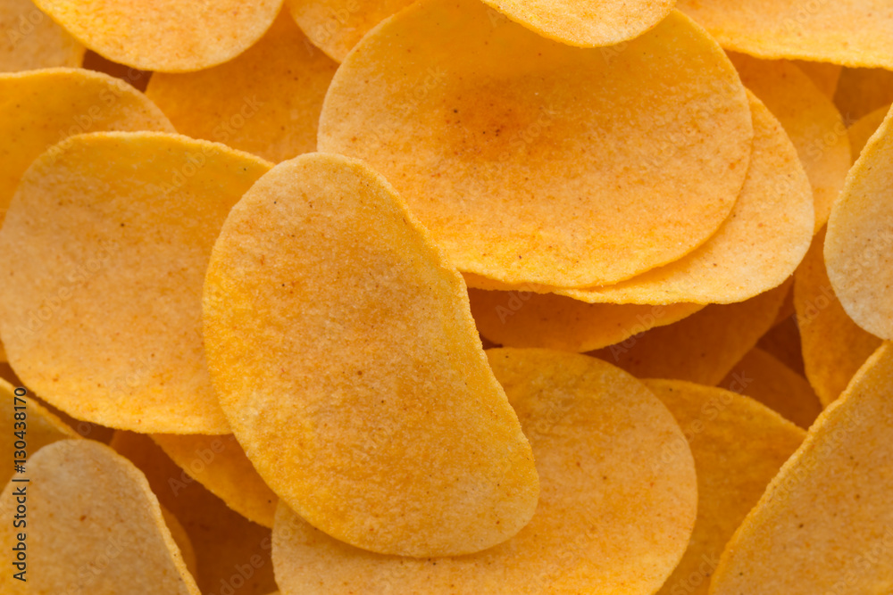 Close up potato chips on wood top view background. Close up potato chips on wood top view background.