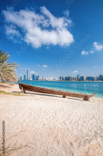 City Abu Dhabi with wooden boats in United Arab Emirates