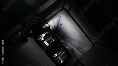 Elevator going up at speed on the elevator shaft