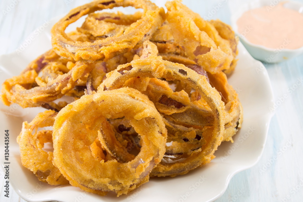 beer battered onion rings close up beer battered onion rings close up