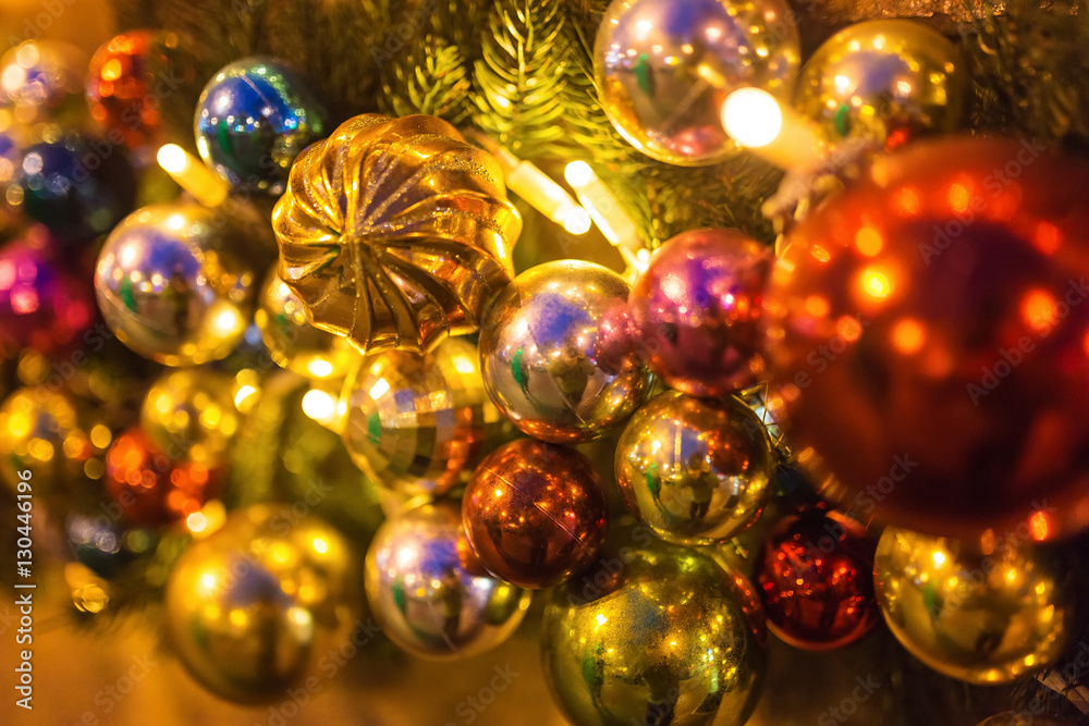 the New Year tree on the city square is decorated with beautiful spheres and garlands the New Year tree on the city square is decorated with beautiful spheres and garlands