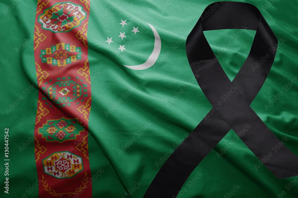 flag of turkmenistan with black mourning ribbon