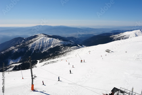 Skiers on the south side of Mount Chopok, Slovakia.
