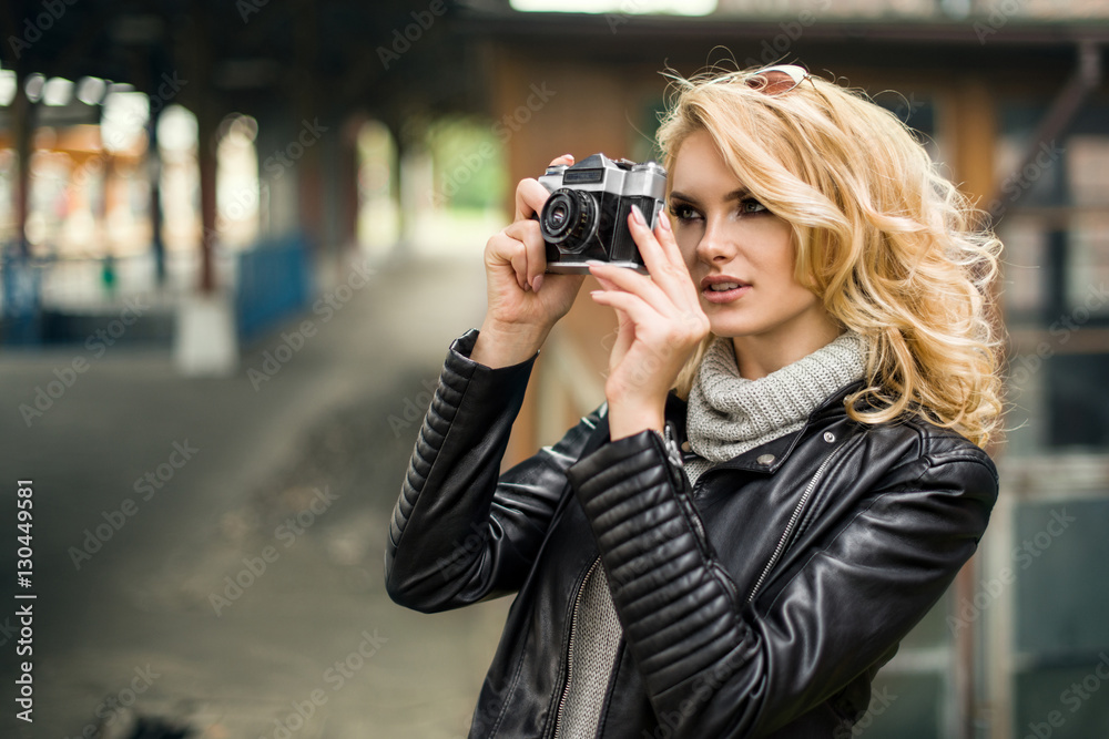 Pretty young woman at a train station Pretty young woman at a train station