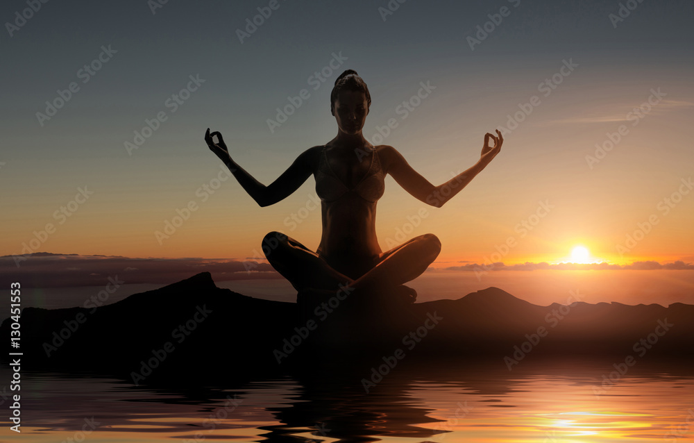 Silhouette of young meditating lady