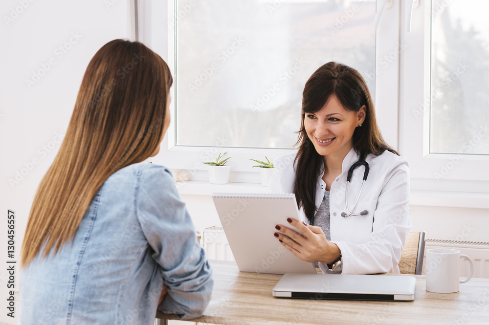 Hospital: Cheerful Doctor Gives Good News To Patient Hospital: Cheerful Doctor Gives Good News To Patient