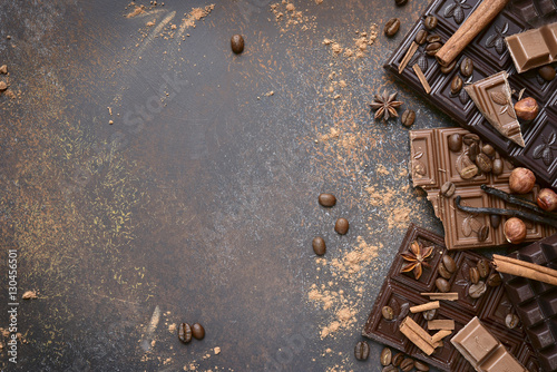 Variety of chocolate bars with spices.Top view.