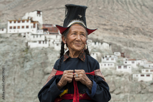 A Nubra woman wears traditional dress to attend a gathering at a local monastery in the Nubra Valley, Ladakh photo