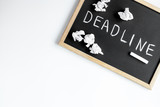 deadline concept on board at white background top view