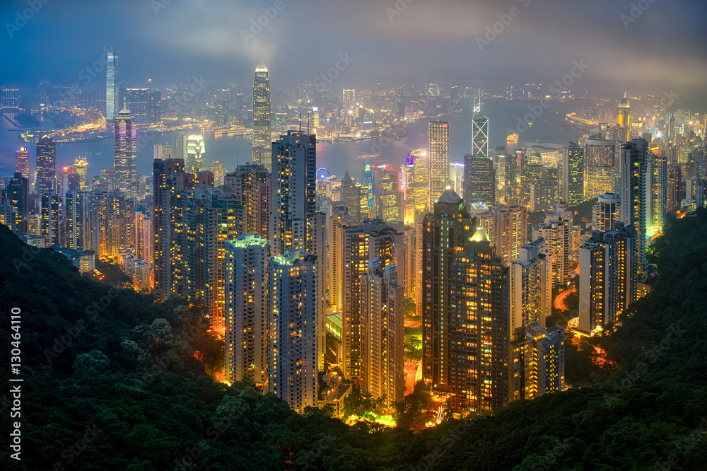 Fog envelops Hong Kong on a summer night seen from Victoria Peak, Hong Kong, China Fog envelops Hong Kong on a summer night seen from Victoria Peak, Hong Kong, China
