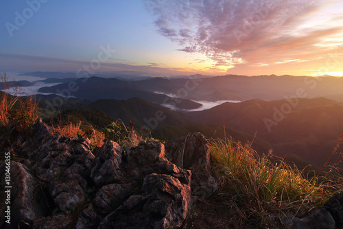 Beautiful scenery during time the sunset view from top of Doi Pha Phung at Nan province in Thailand is a very popular for photographers and tourists. Attractions and natural Concept photo