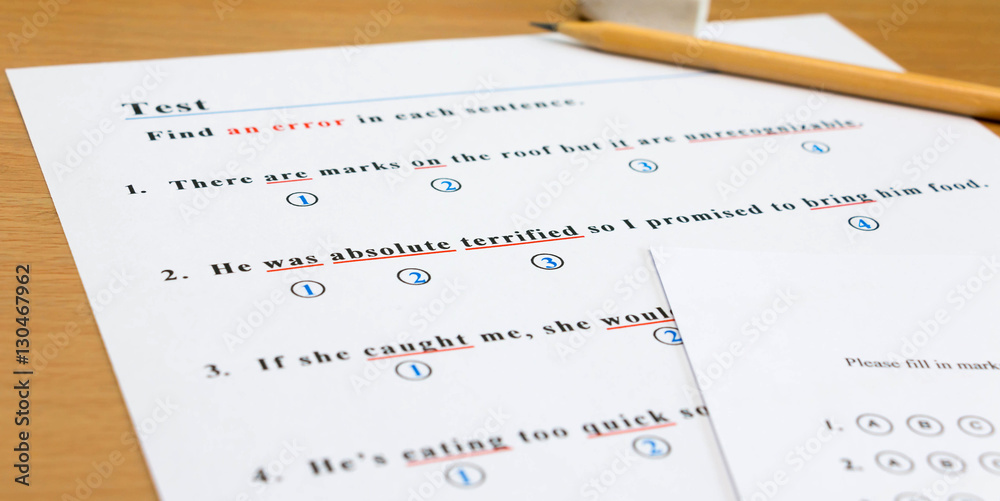 Obraz premium english test and answer sheet on table
