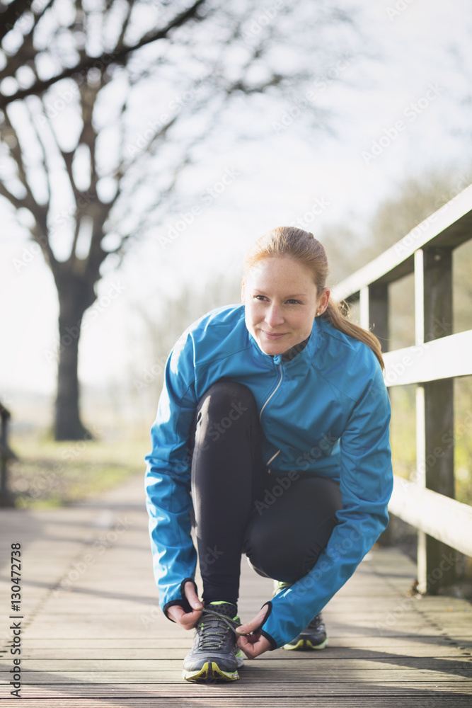 Fototapeta premium Woman Doing Sports in a Park