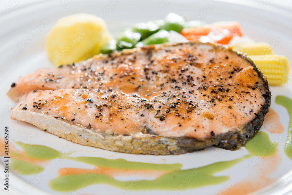 Grilled Salmon with fresh salad . Selective focus.. Grilled Salmon with fresh salad . Selective focus..