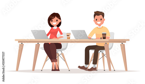 Businessman and  businesswoman for the common desktop work compu