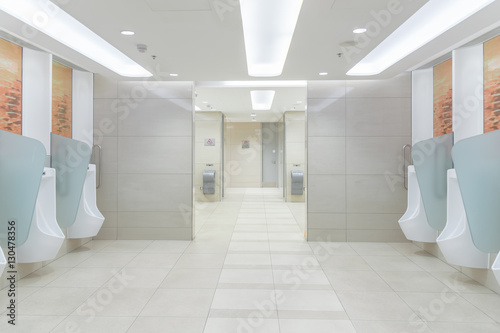 Clean public men toilet in modern international airport for service all passengers