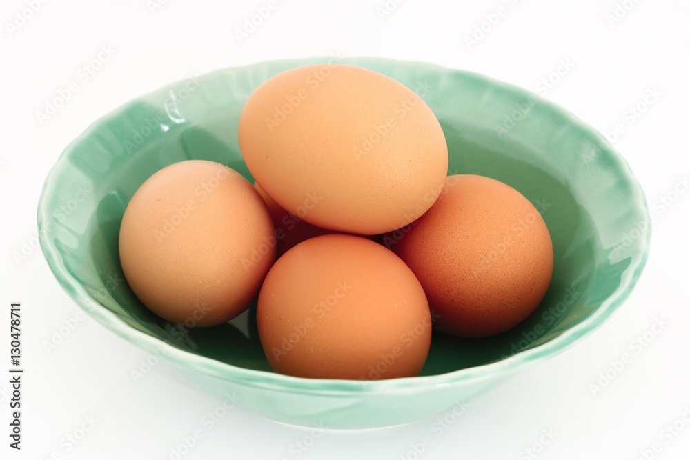 eggs in bowl isolated on white background eggs in bowl isolated on white background