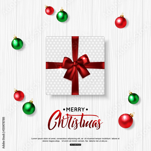Merry Christmas background with green, red balls and gift box. Top view. Vector illustration.