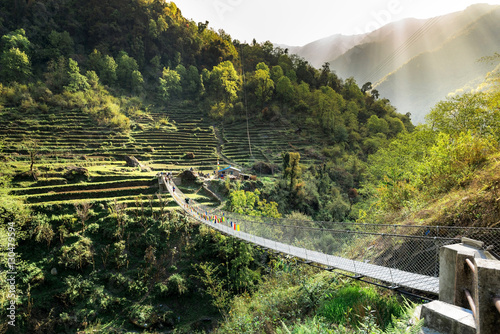 Nepal. Suspension bridge in Himalayan Mountains..