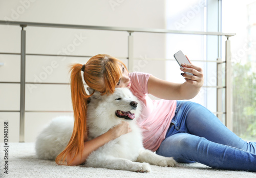 Girl taking selfie with Sam...