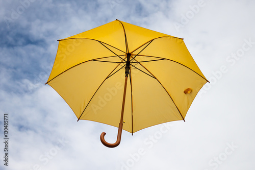 Umbrella and sky close-up.