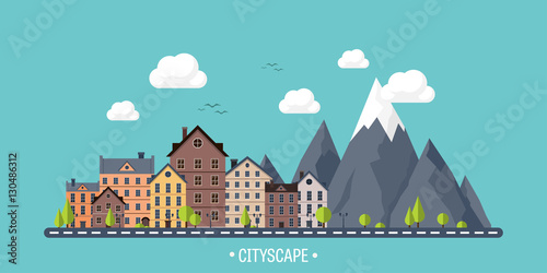 City in summer. Urban landscape with mountains. Town. Mountain peak,snow. House in village. Weather.