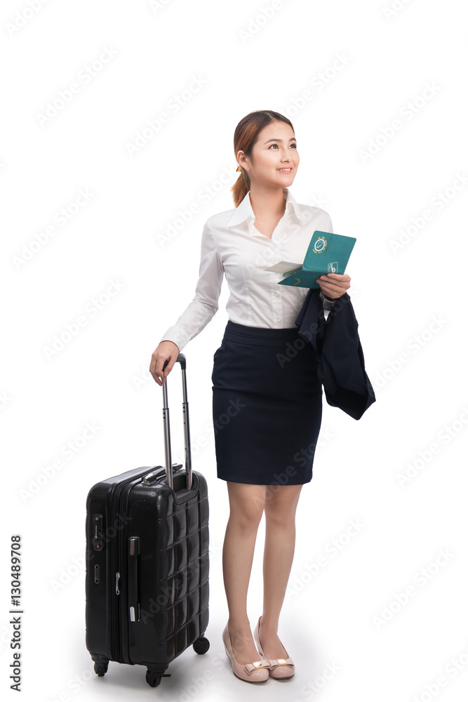 Full body business woman traveling with suitcase and holding pas Full body business woman traveling with suitcase and holding pas