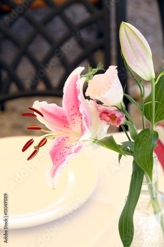 Fototapeta Naklejka Na Ścianę i Meble -  rose lilies on table bouquet
