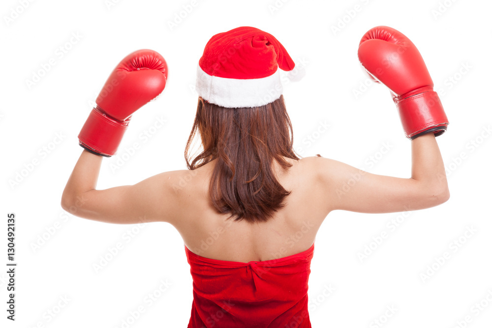 Asian Christmas Santa Claus girl with boxing glove. Asian Christmas Santa Claus girl with boxing glove.