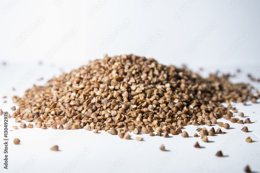Buckwheat is scattered on the table. Buckwheat is scattered on the table.
