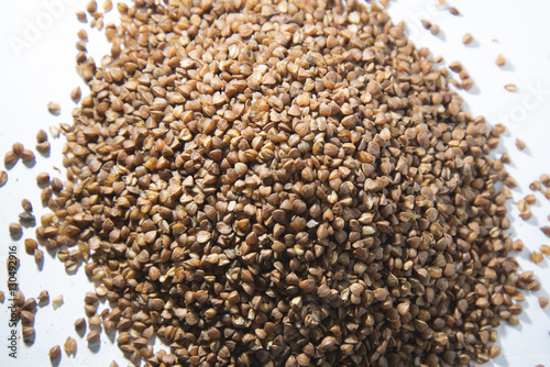 Buckwheat is scattered on the table.
