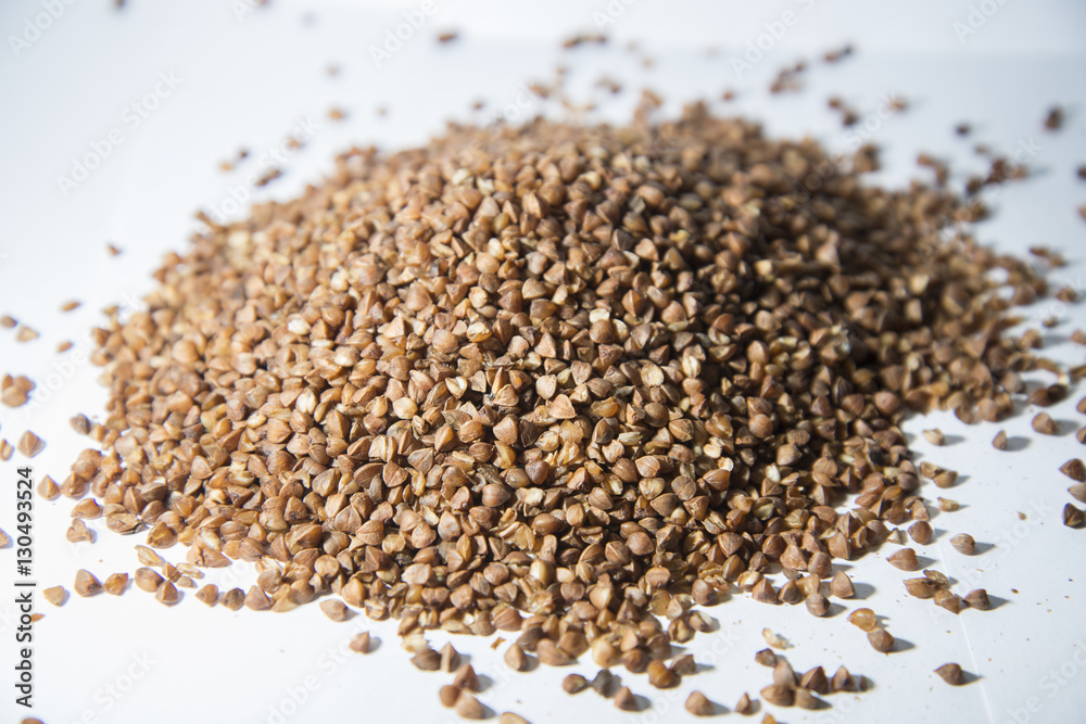 Buckwheat is scattered on the table. Buckwheat is scattered on the table.