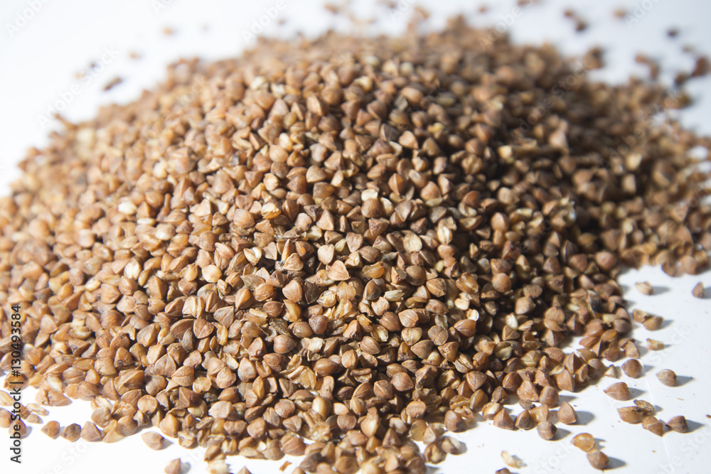 Buckwheat is scattered on the table. Buckwheat is scattered on the table.