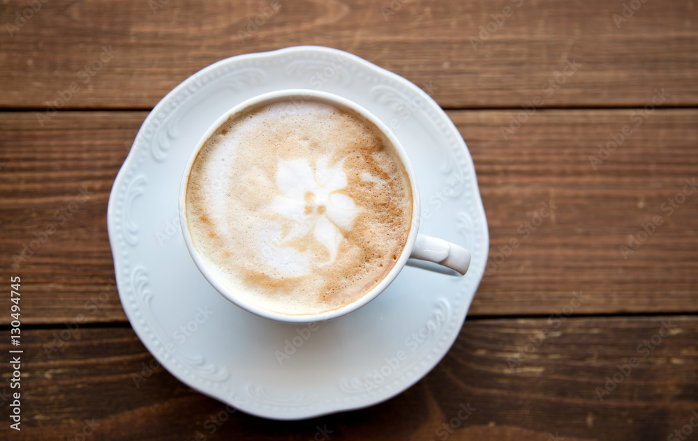 Cup of coffee on old table Cup of coffee on old table