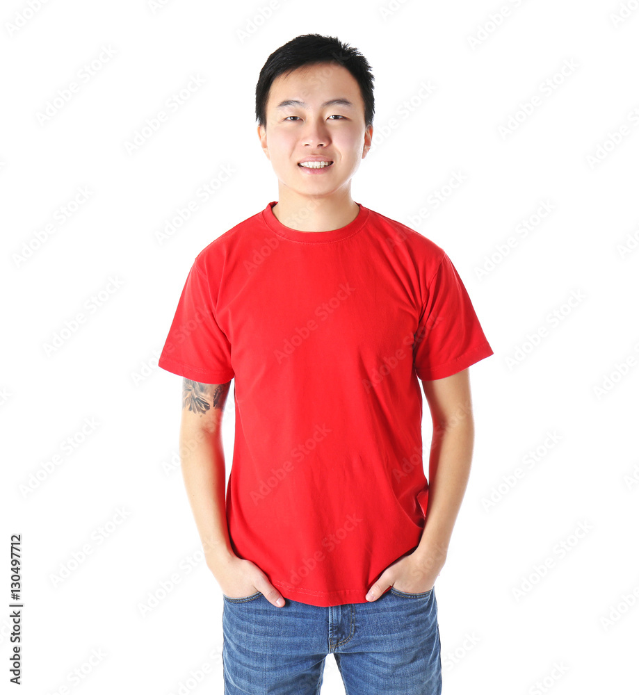 Asian man in blank red t-shirt on white background Asian man in blank red t-shirt on white background