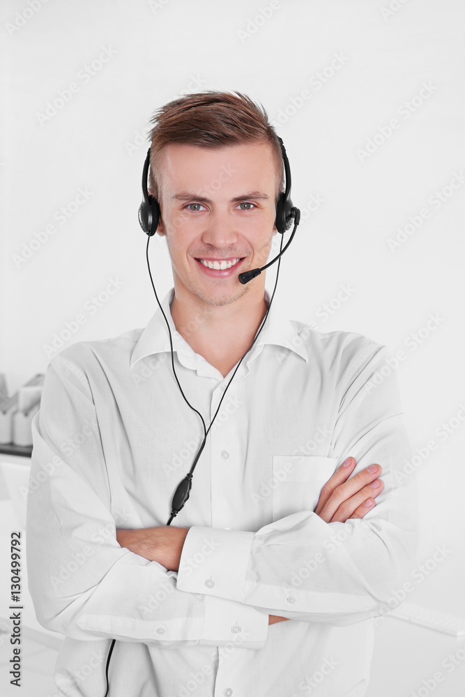 Young handsome technical support dispatcher working, closeup Young handsome technical support dispatcher working, closeup