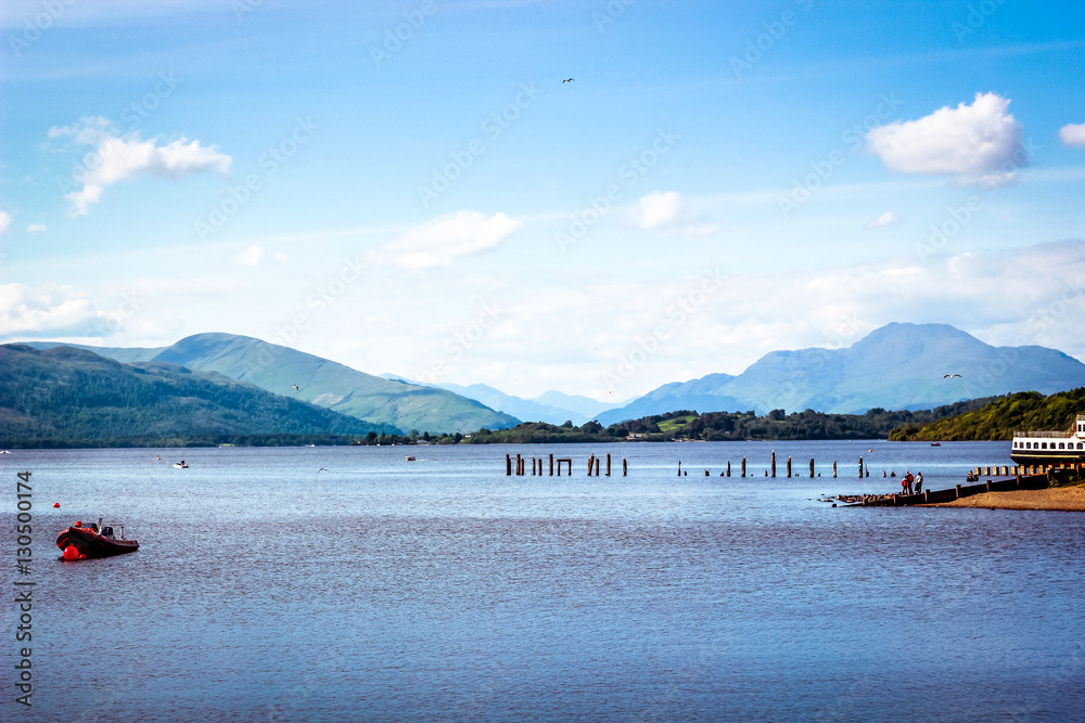Obraz premium Landscape of Loch Lomond in highland of Scotland, second biggest waterbody lake on earth