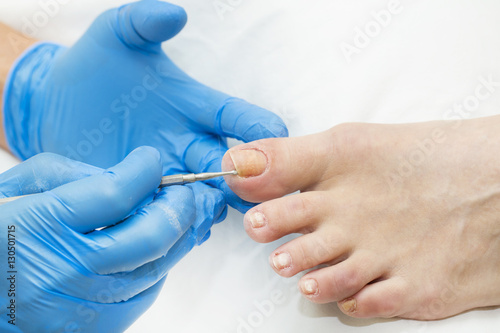 Process of pedicure at beauty salon