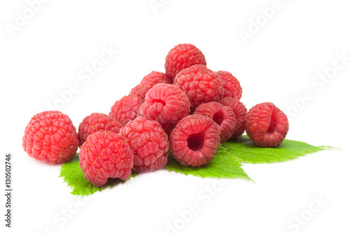 Raspberries with leaves isolated on a white background with clipping path