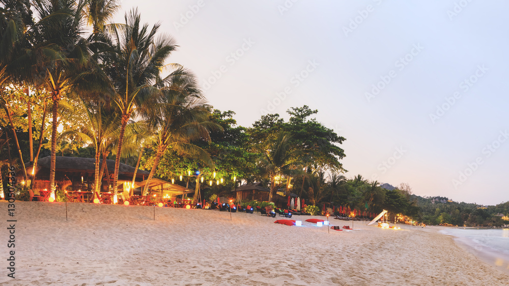 Naklejka premium Evening Phangan beach with white sand and cristal clear water