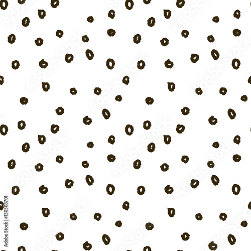 Vector doodle pattern with dots, made of brush stroke. Black and white seamless background.