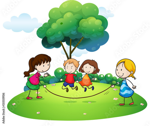 Children playing jump rope in the park
