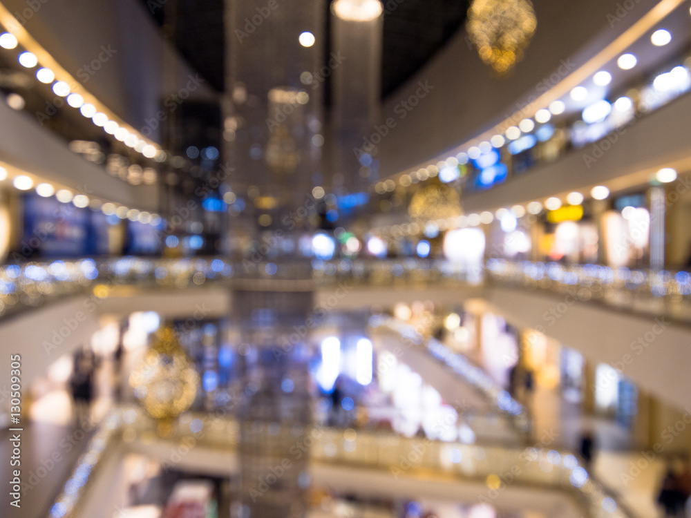 Time of Christmas sales, shopping center, festively decorated. blurred background