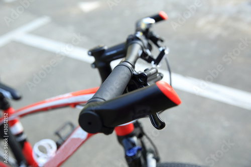 closeup of mountain bike at parking lot