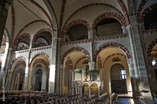 Arches and pulpit in the Basilica of Saint Ambrogio photo