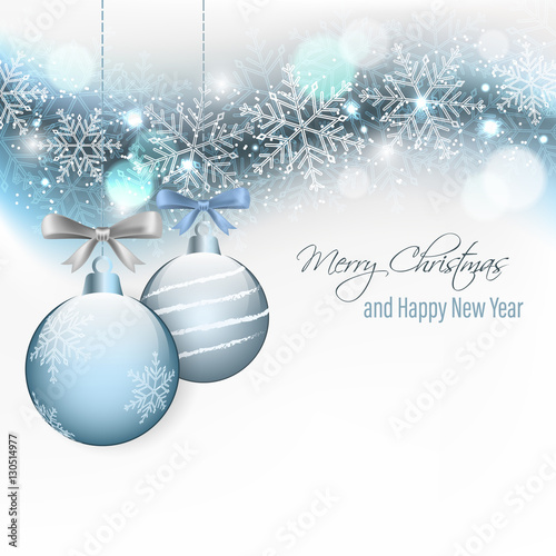 Christmas and New Year wishes with hanging baubles and bow.