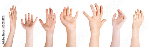 Many hands reaching out in the air, white background, copy space