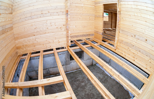 Construction of a new wooden house. Inside view