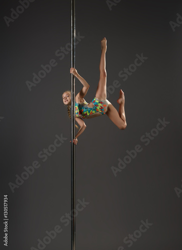 Little girl on pylon studio shot