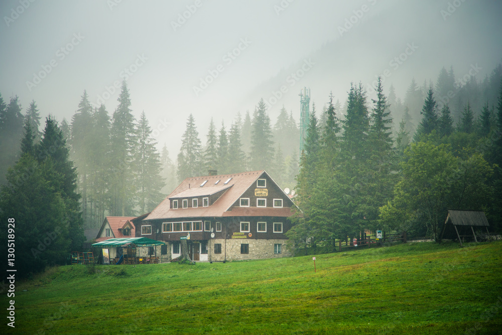 A beautiful mountain landscape in Tatry, Slovakia with a house
